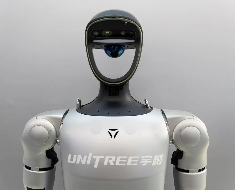 the-unitree-humanoid-robot-with-sleek-design-dual-arm-and-sensor-equipped-head